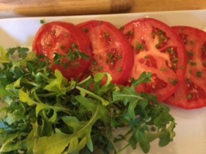 tomatoes with chives & arugula